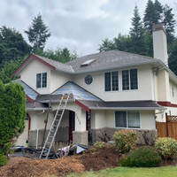 new roof under construction on large home
